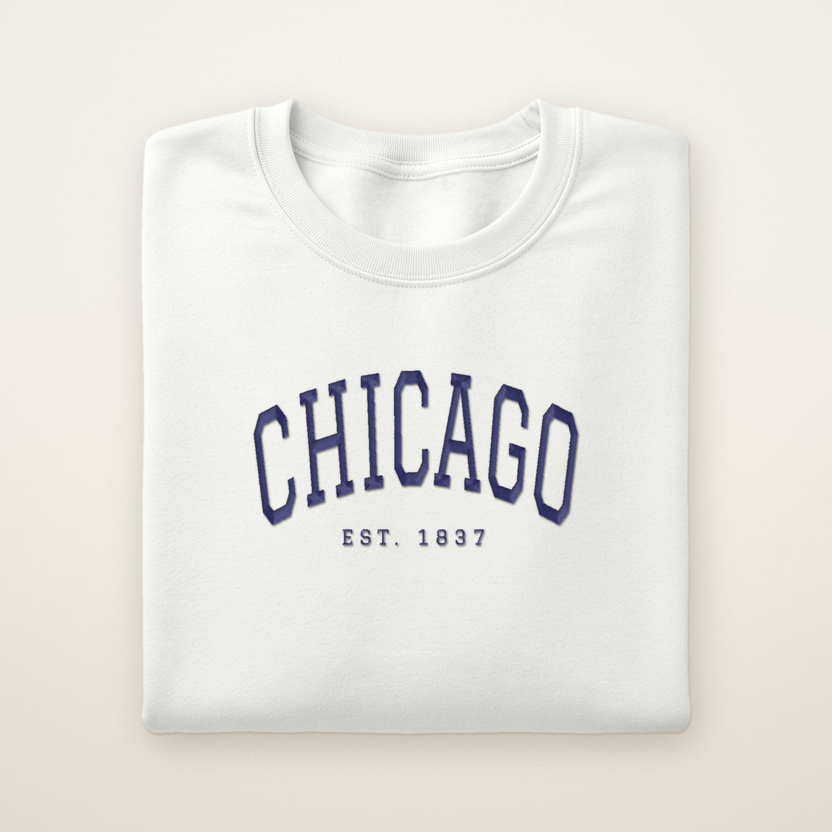 Chicago Est. 1837 embroidered crewneck with navy thread on a white sweatshirt