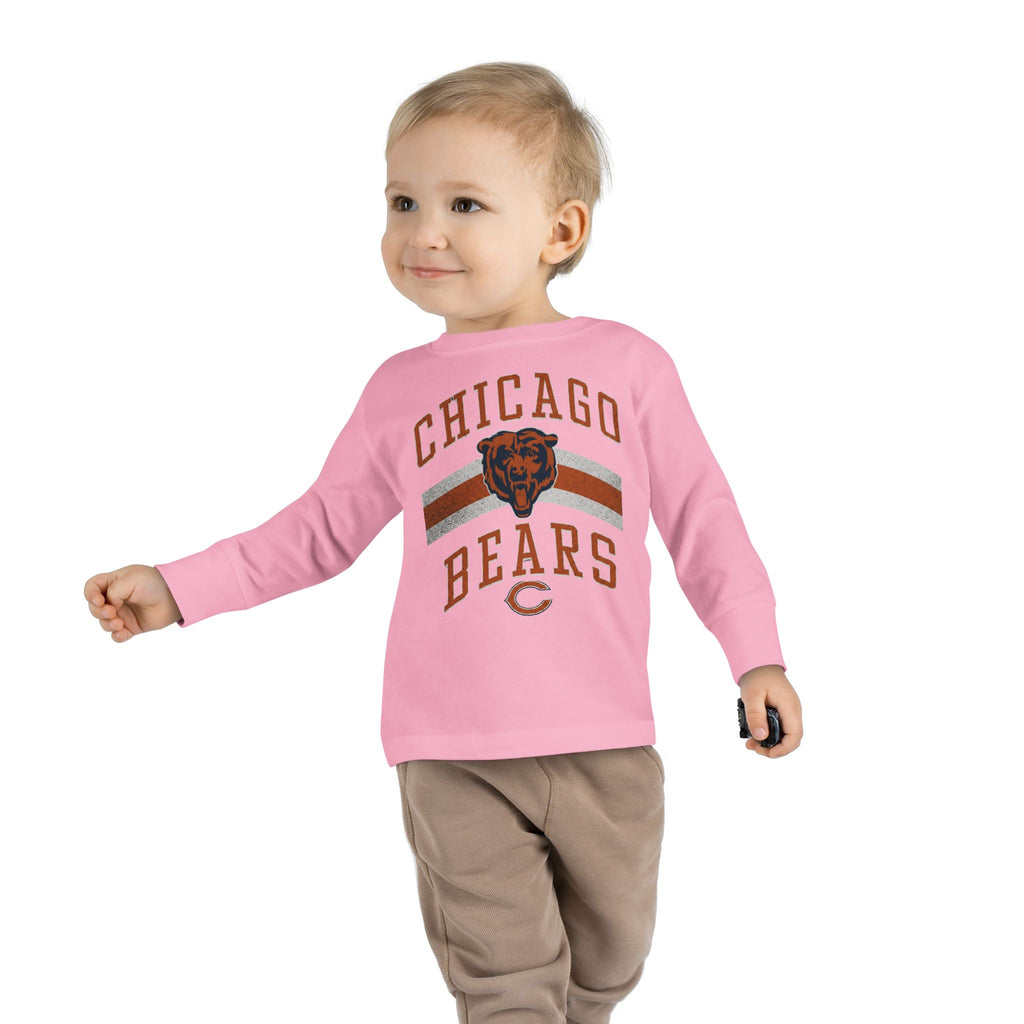 Toddler wearing the Vintage Chicago Bears toddler long-sleeve tee in pink, side view