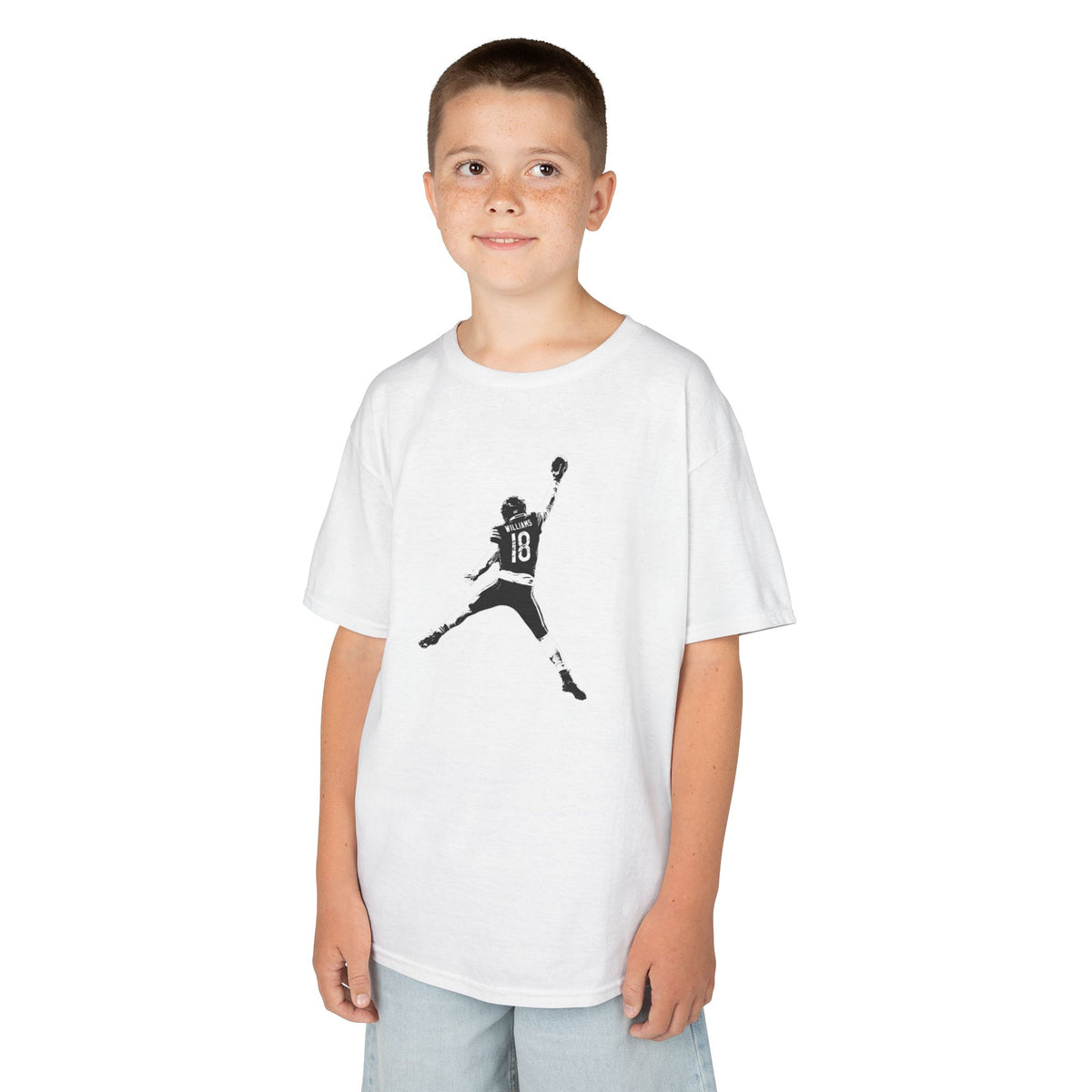 Boy wearing the Youth Caleb Williams Jump Man t-shirt in white