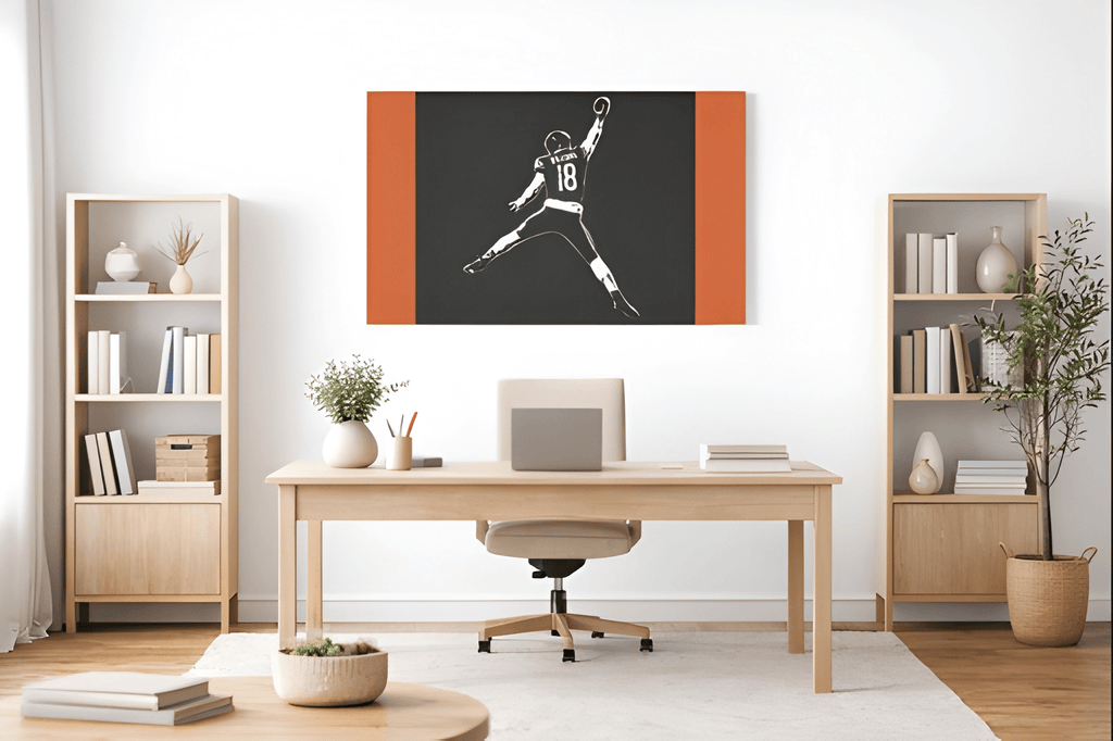 Caleb Williams navy and orange silhouette canvas above a desk in a home office