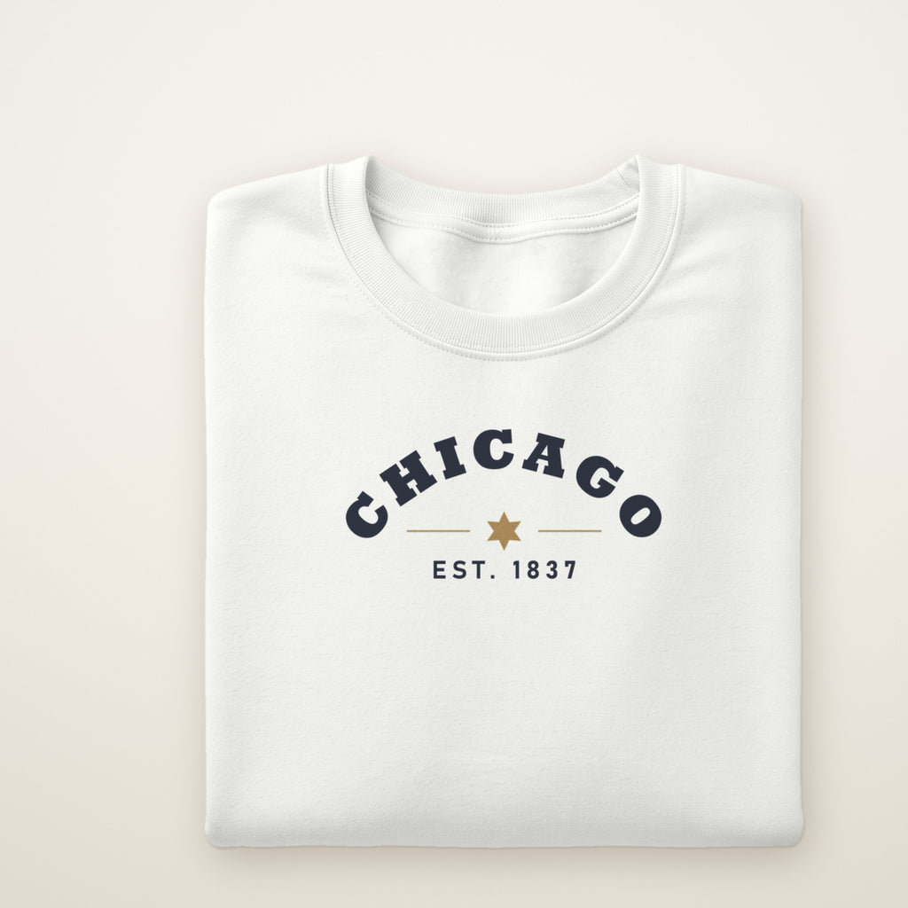 Chicago Est. 1837 youth crewneck in White, flat lay with navy arched CHICAGO and gold star