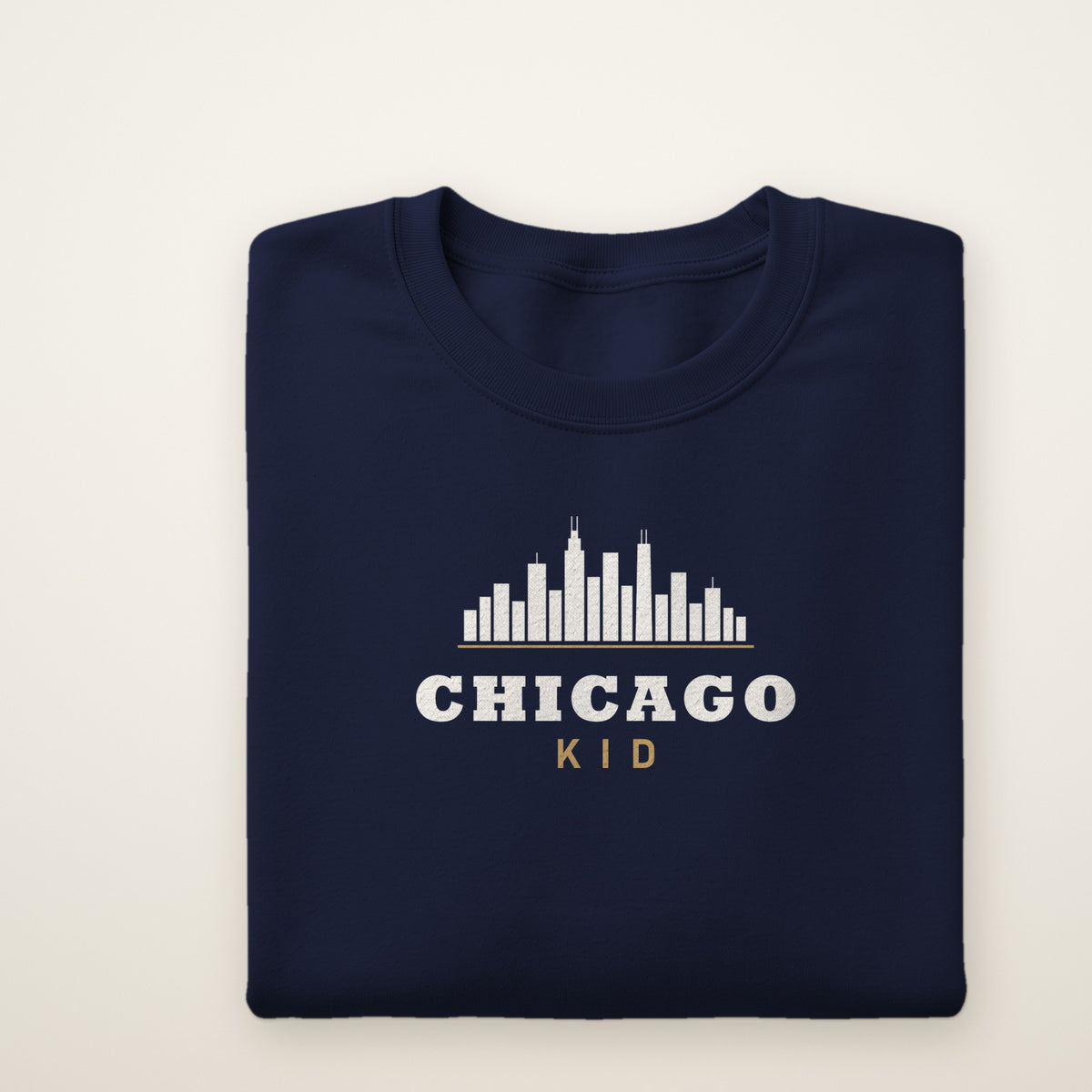 Chicago Kid skyline youth crewneck in Navy, flat lay with white skyline and gold KID
