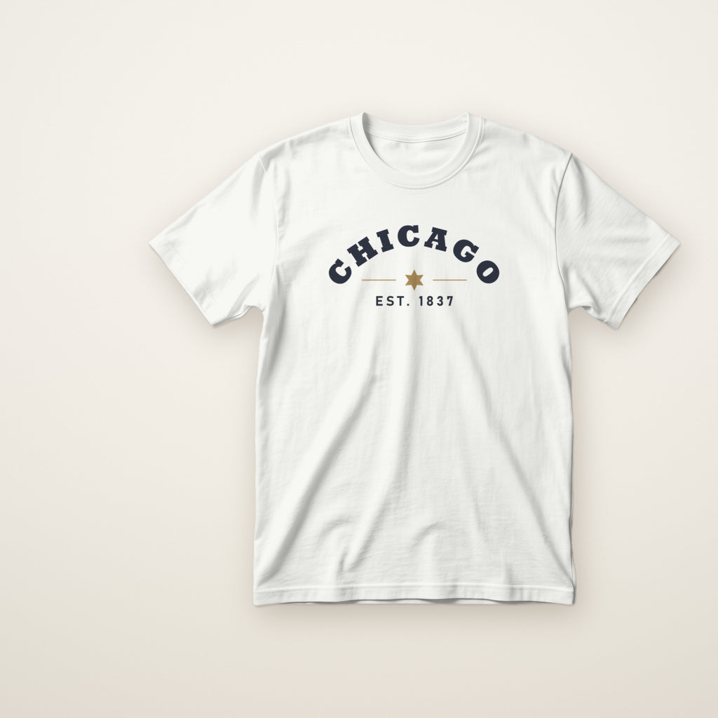 Chicago Est. 1837 toddler tee in White, flat lay with navy arched CHICAGO print