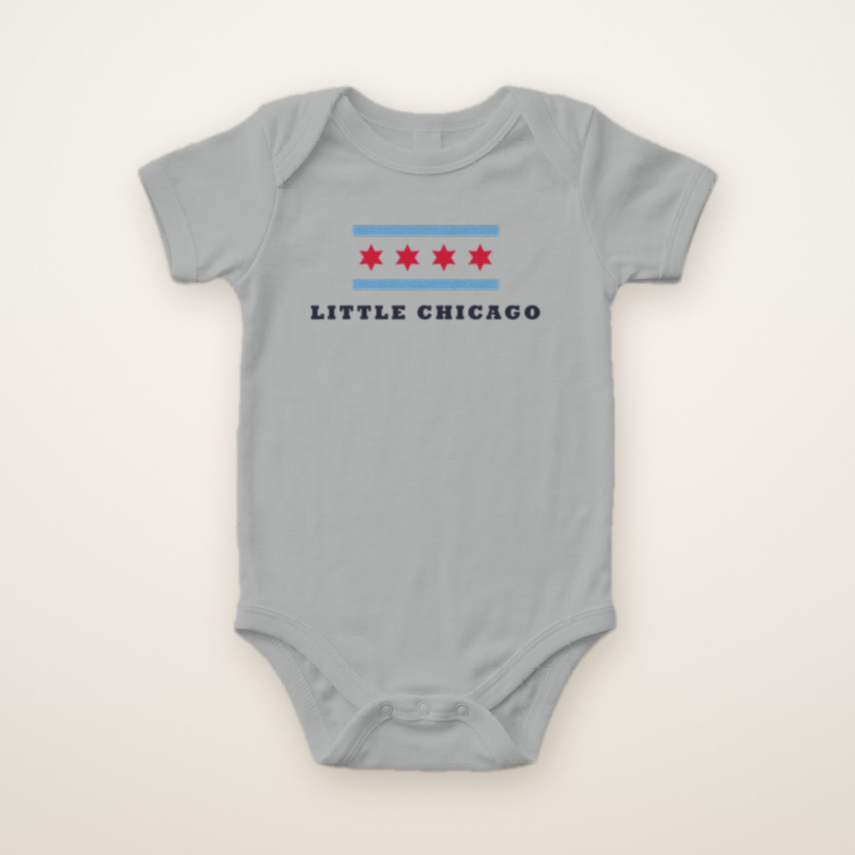 Little Chicago Four Star baby bodysuit in Heather, flat lay with Chicago flag stars print