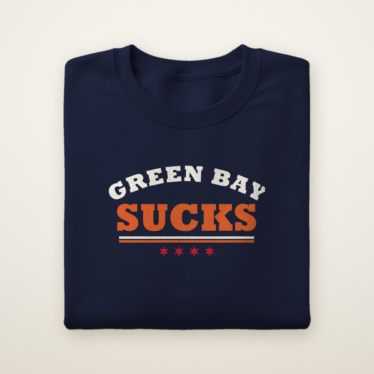 Green Bay Sucks Varsity crewneck in Navy, flat lay with arched GREEN BAY over orange SUCKS