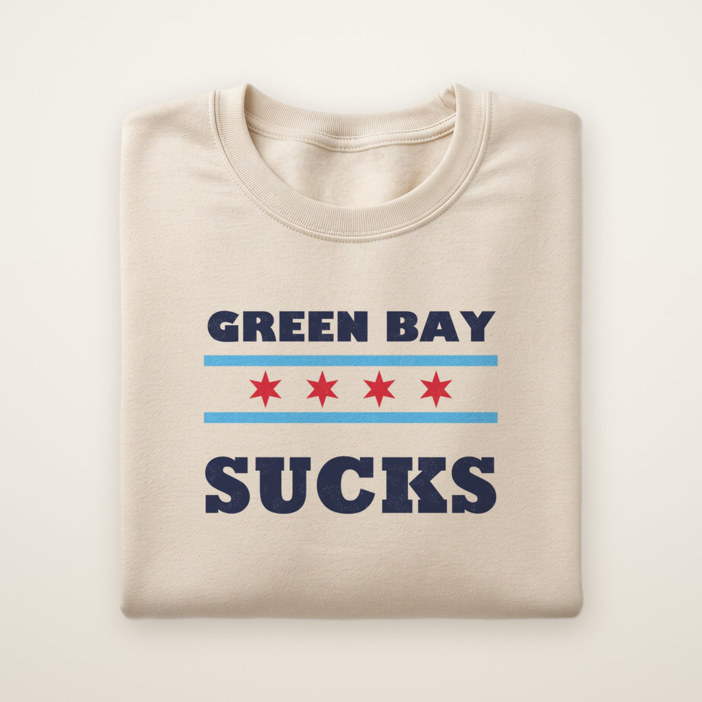 Green Bay Sucks Chicago Flag crewneck in Sand, flat lay with Chicago flag stars between the words
