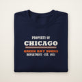 Property of Chicago Green Bay Sucks Dept. crewneck in Navy, flat lay with athletic-department print