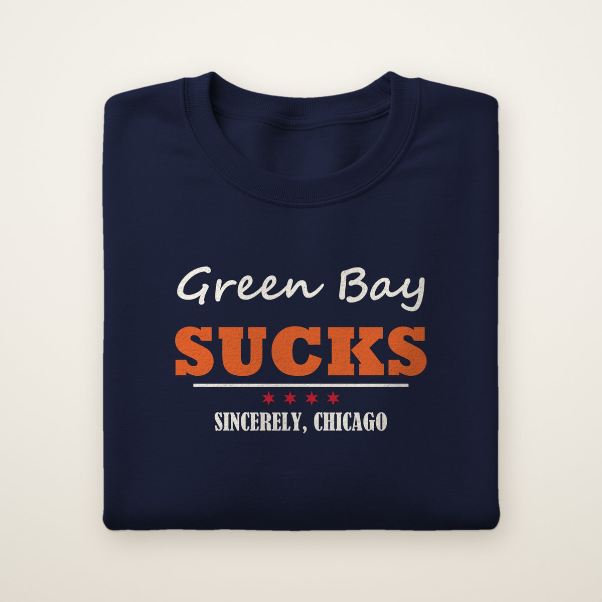 Green Bay Sucks Sincerely, Chicago crewneck in Navy, flat lay with script Green Bay and orange SUCKS