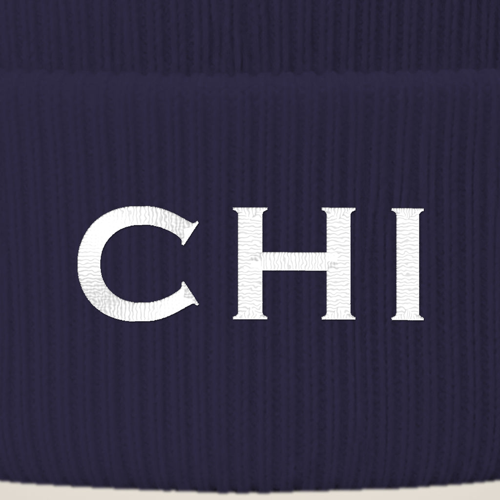 Close-up of CHI embroidery on the beanie cuff