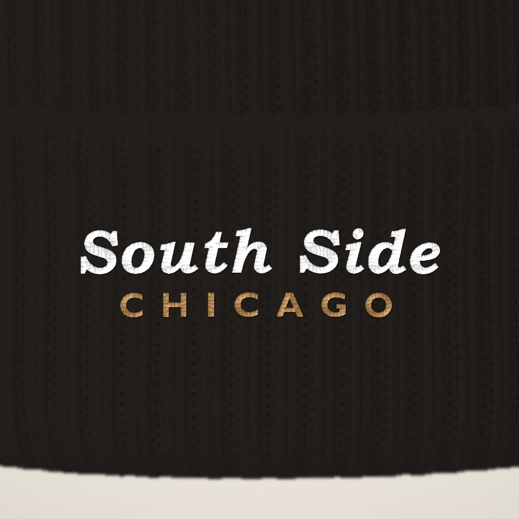 Close-up of South Side Chicago embroidery on the pom-pom beanie cuff