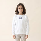 Child wearing the Chicago embroidered youth crewneck in White, navy thread