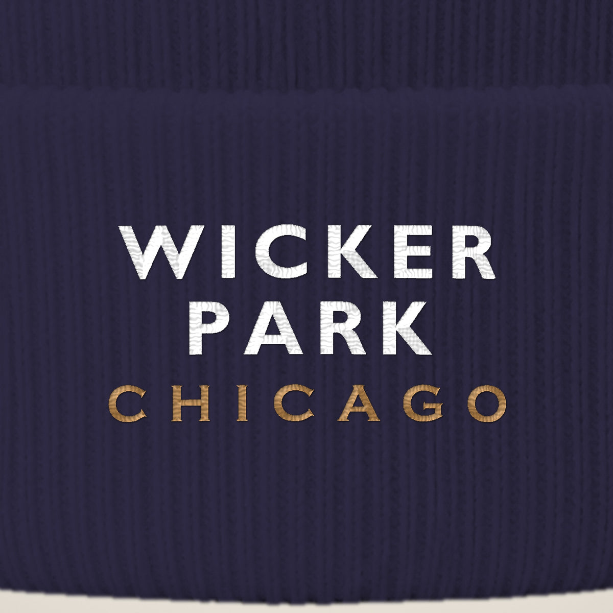 Wicker Park Chicago embroidery close-up in white and old gold thread