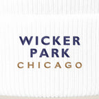 Wicker Park Chicago embroidery close-up in navy and old gold thread