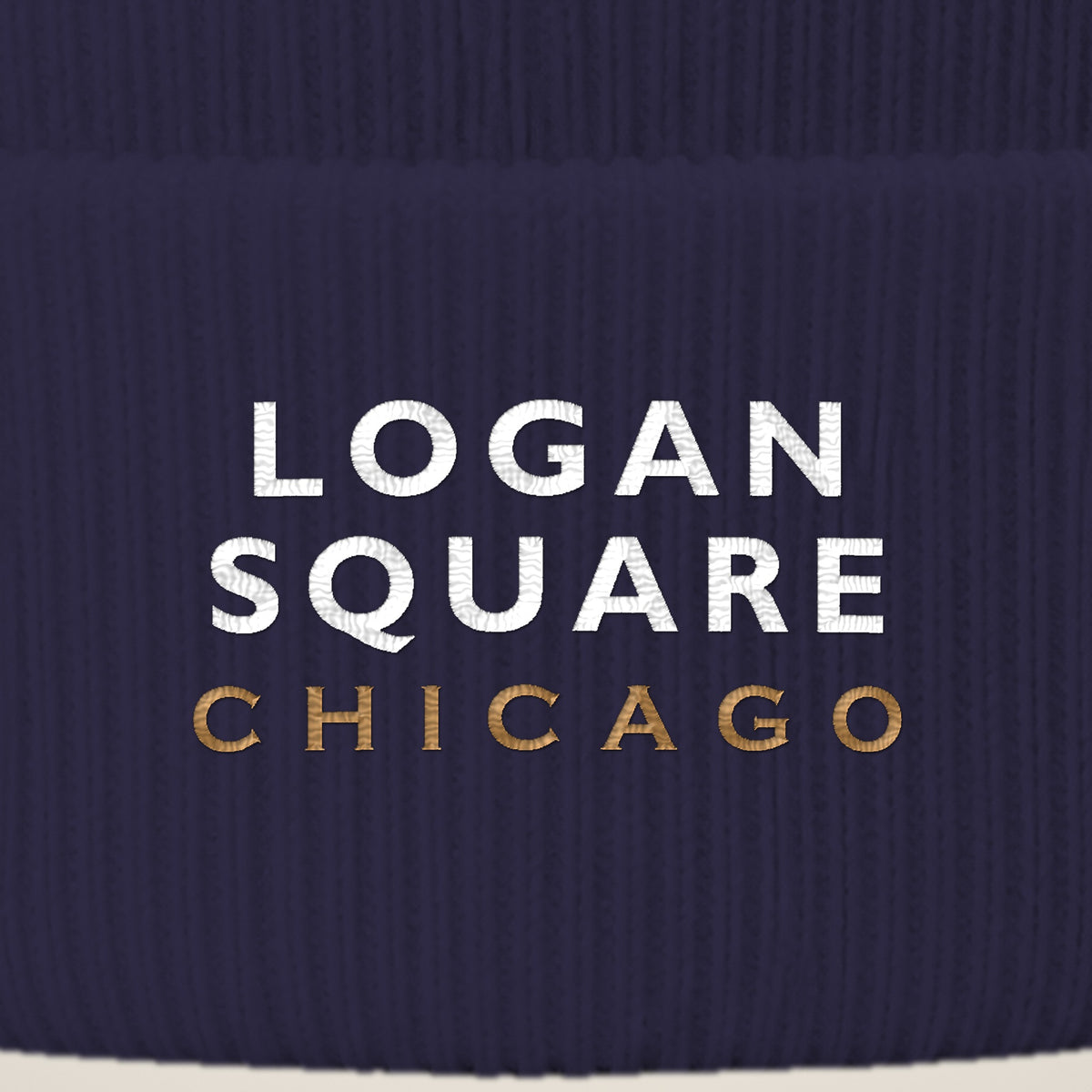 Logan Square Chicago embroidery close-up in white and old gold thread