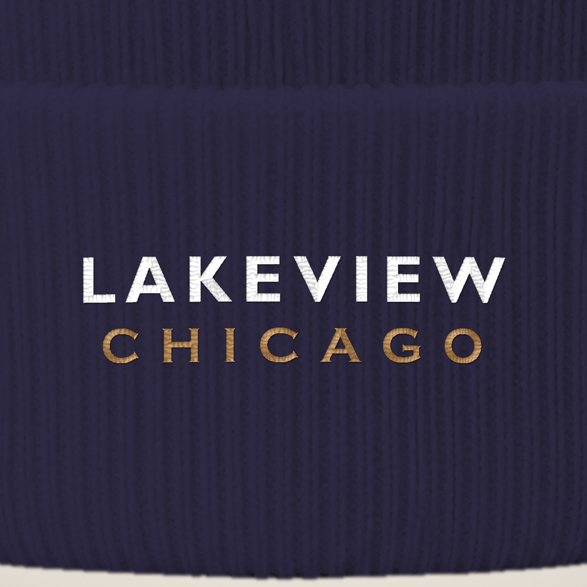 Lakeview Chicago embroidery close-up in white and old gold thread