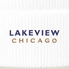 Lakeview Chicago embroidery close-up in navy and old gold thread