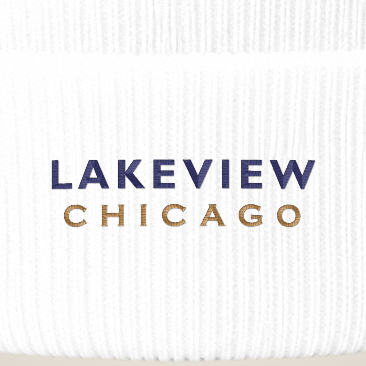 Lakeview Chicago embroidery close-up in navy and old gold thread