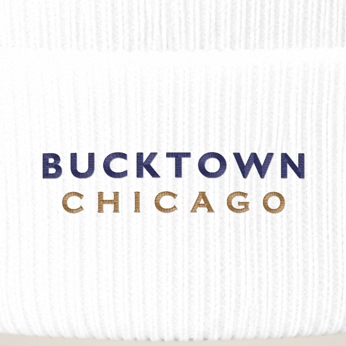 Bucktown Chicago embroidery close-up in navy and old gold thread