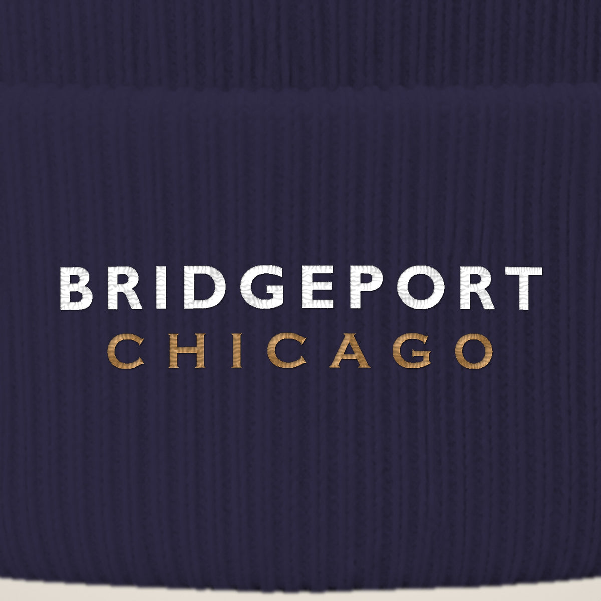 Bridgeport Chicago embroidery close-up in white and old gold thread