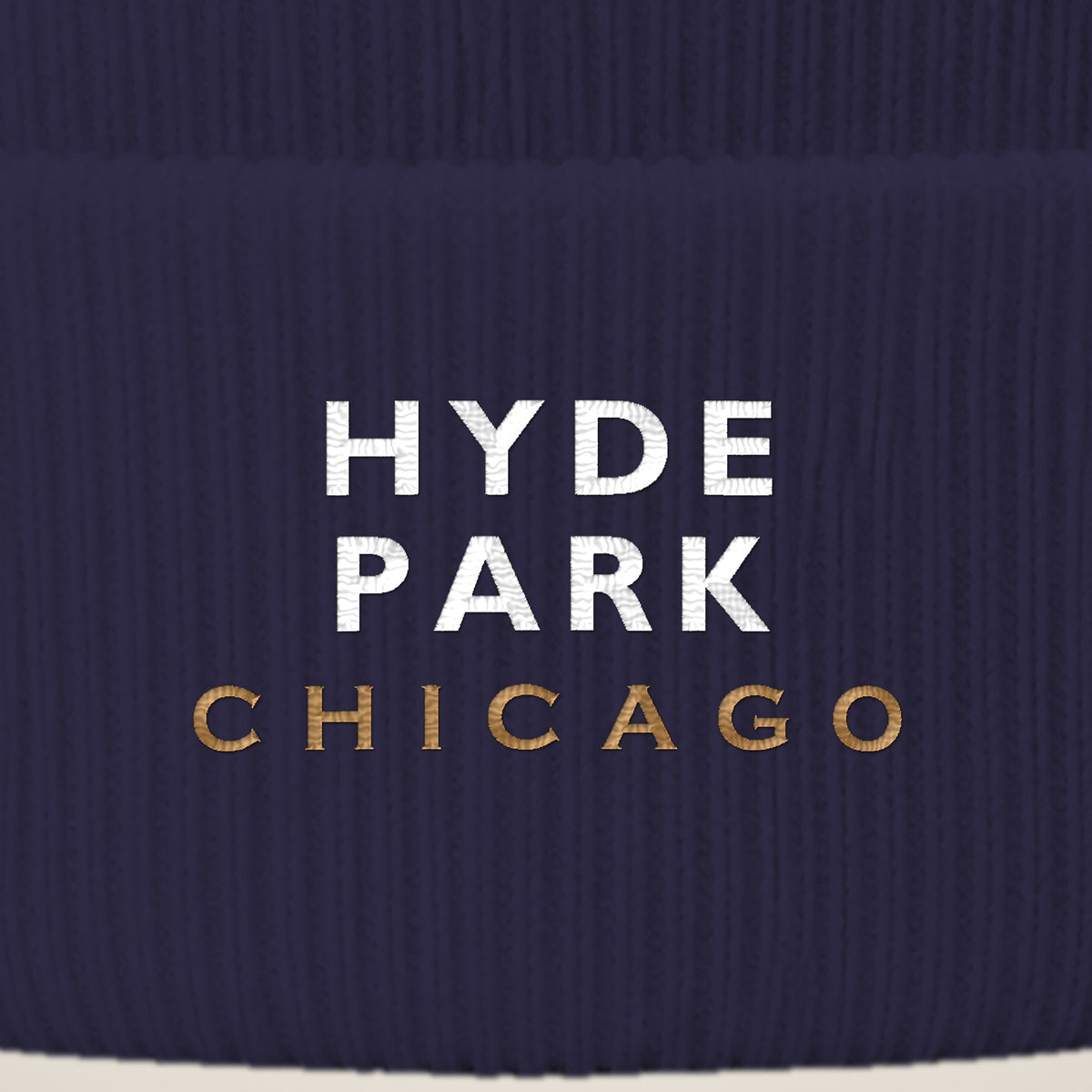 Hyde Park Chicago embroidery close-up in white and old gold thread