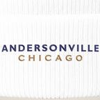 Andersonville Chicago embroidery close-up in navy and old gold thread