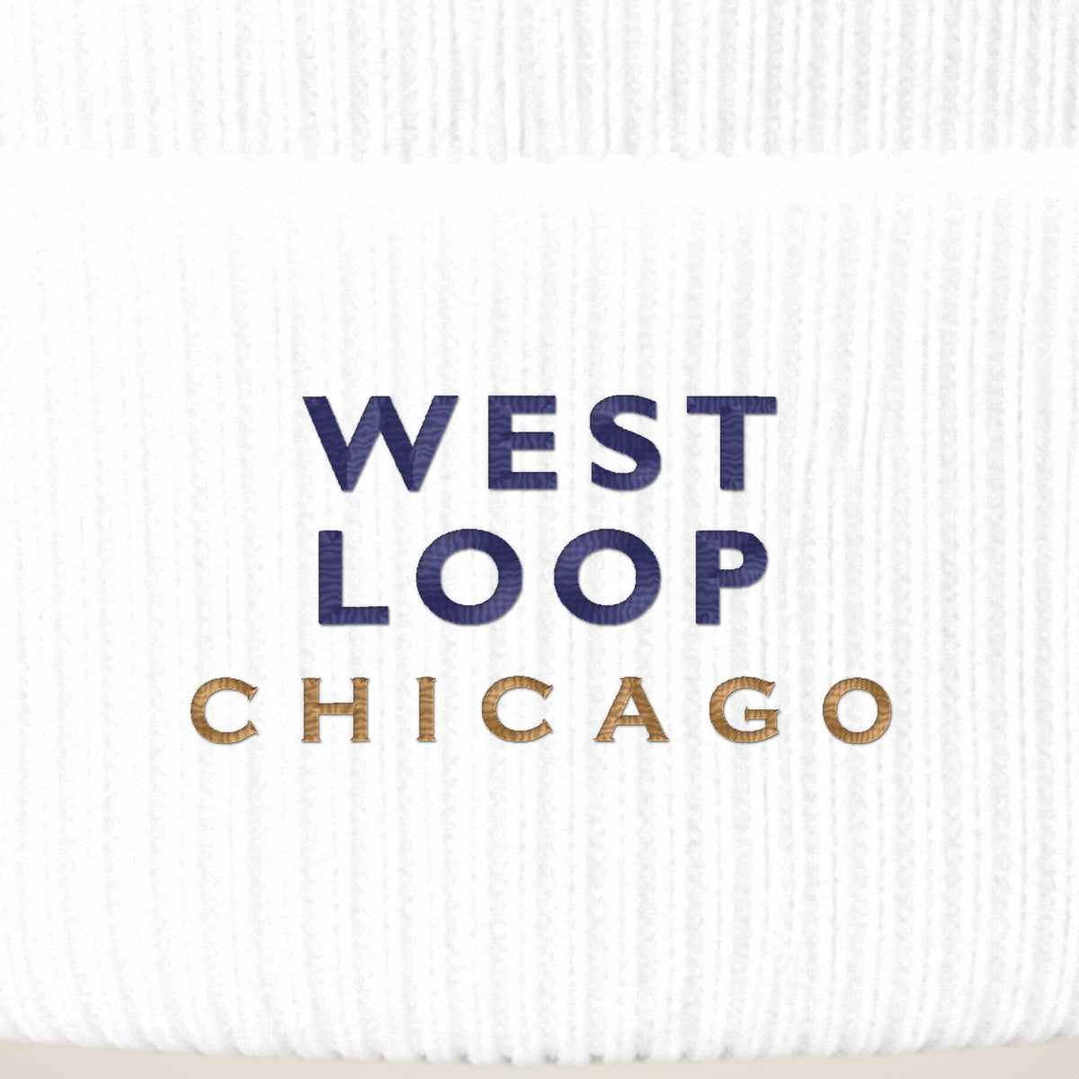 West Loop Chicago embroidery close-up in navy and old gold thread