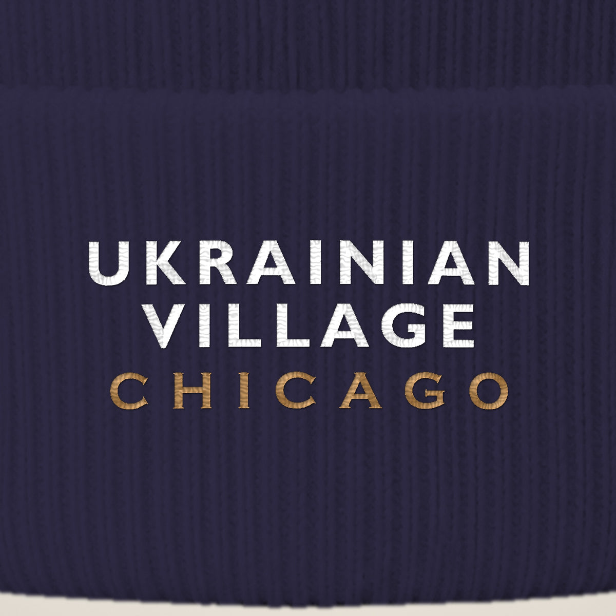 Ukrainian Village Chicago embroidery close-up in white and old gold thread