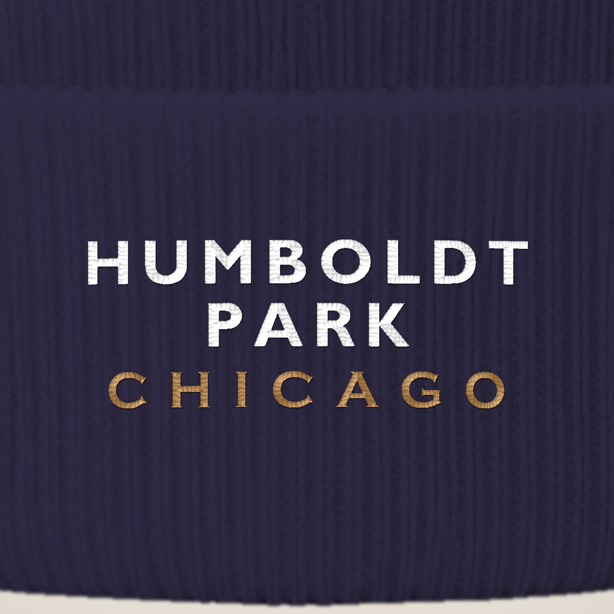 Humboldt Park Chicago embroidery close-up in white and old gold thread