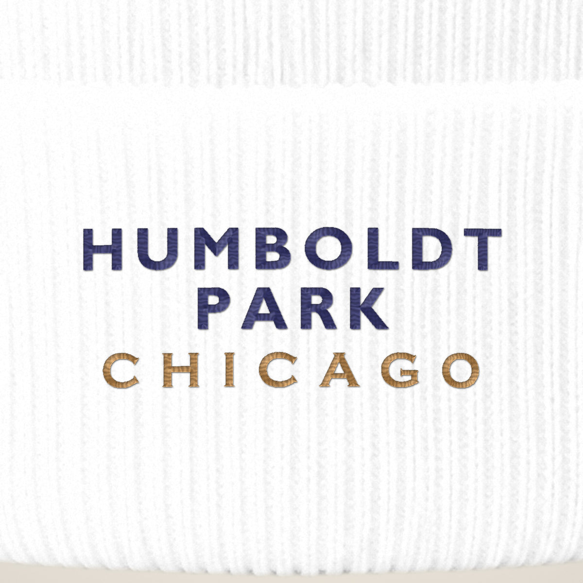 Humboldt Park Chicago embroidery close-up in navy and old gold thread