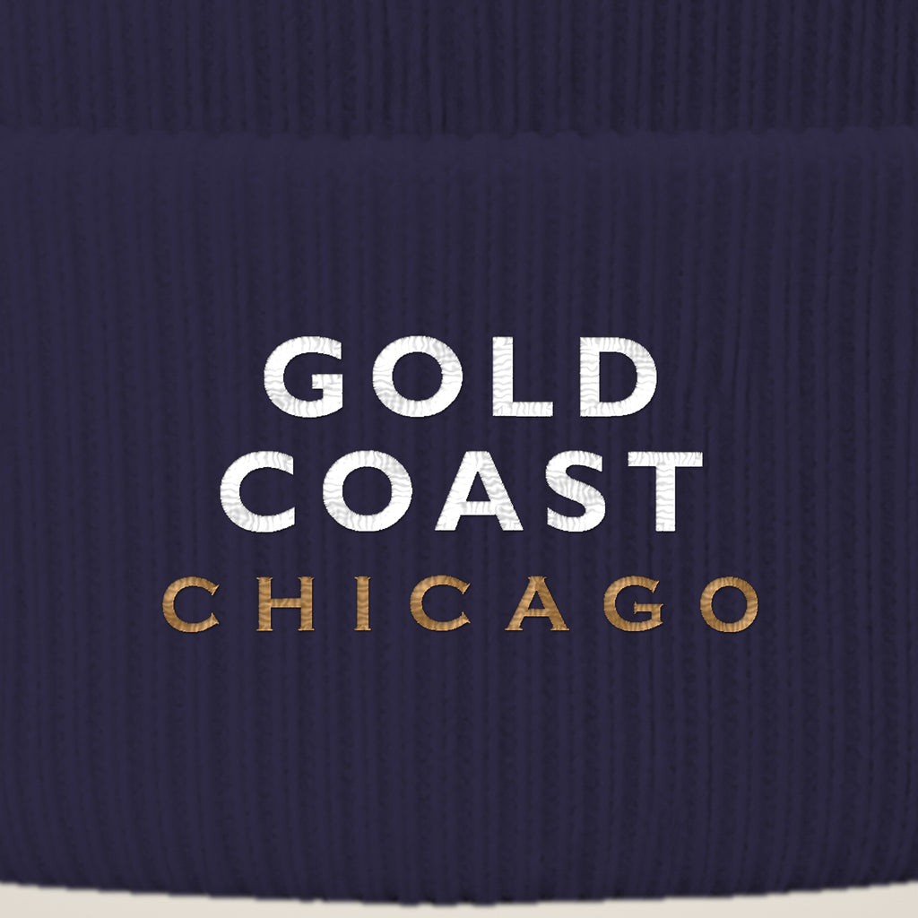 Gold Coast Chicago embroidery close-up in white and old gold thread