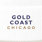 Gold Coast Chicago embroidery close-up in navy and old gold thread