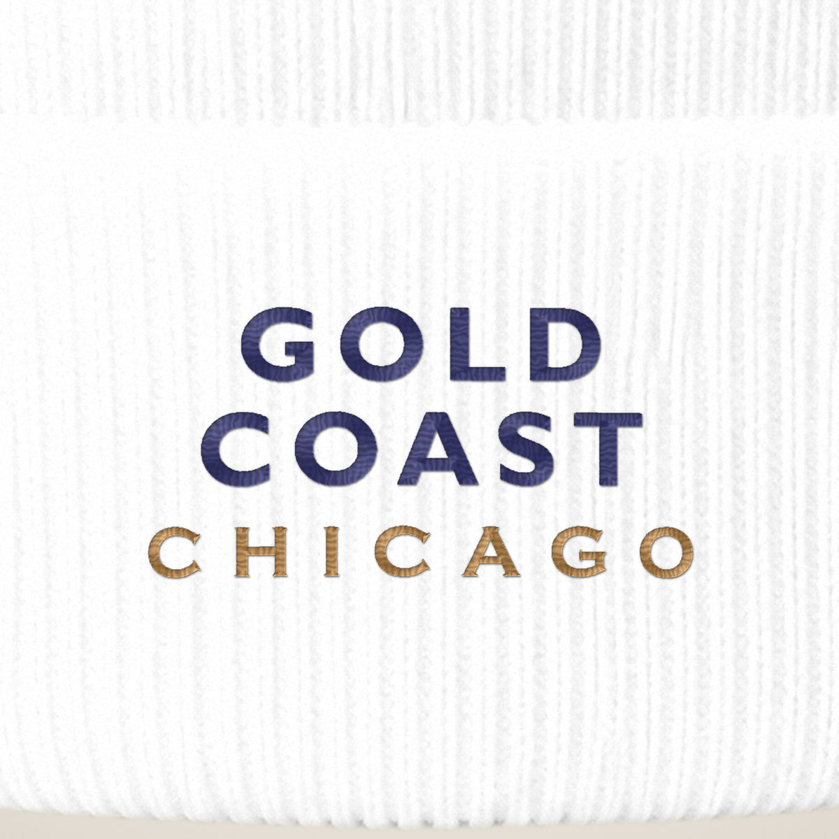 Gold Coast Chicago embroidery close-up in navy and old gold thread
