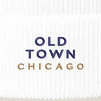 Old Town Chicago embroidery close-up in navy and old gold thread