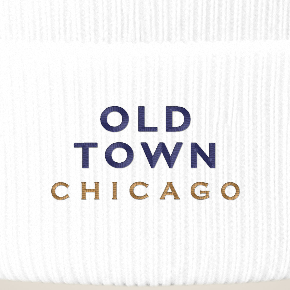 Old Town Chicago embroidery close-up in navy and old gold thread