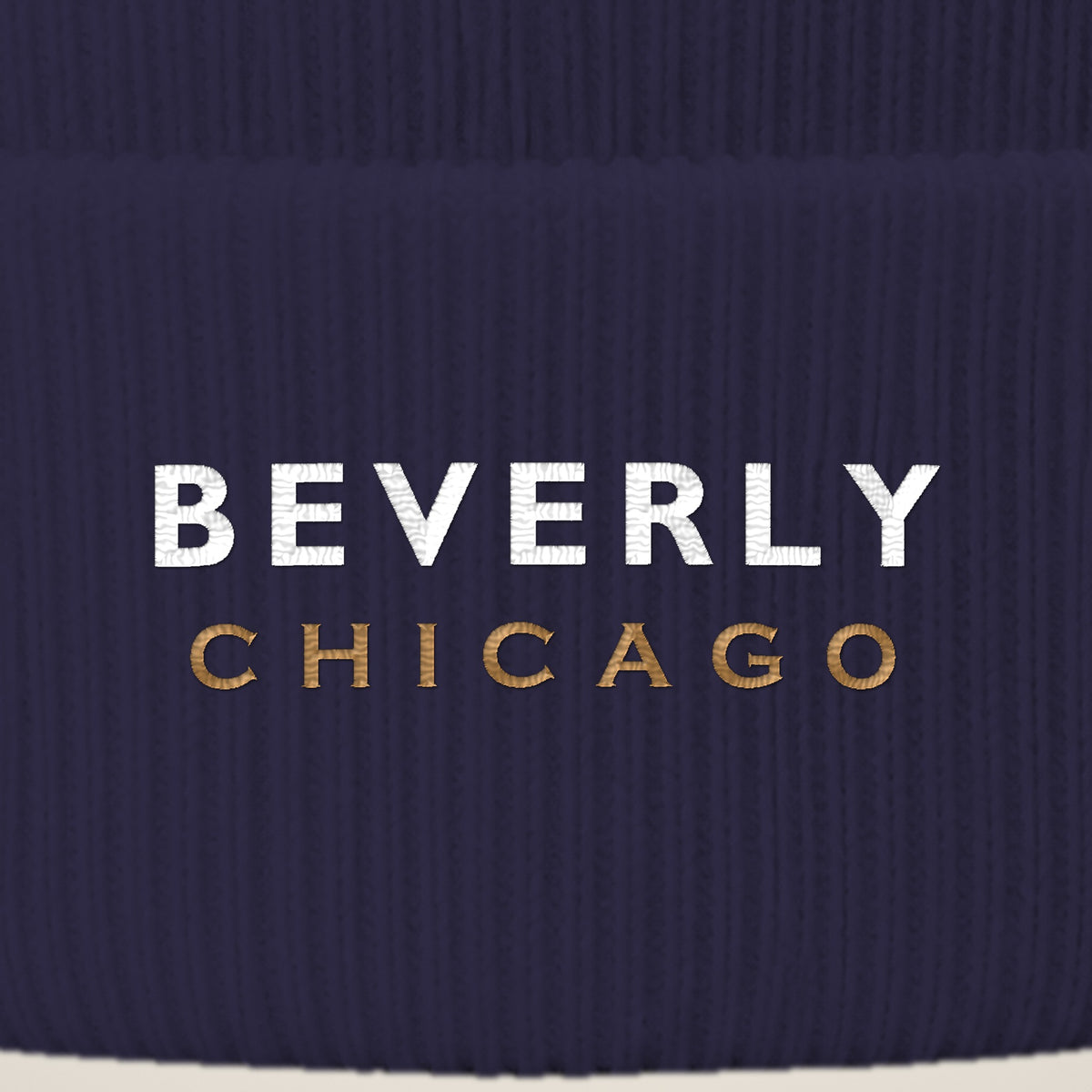 Beverly Chicago embroidery close-up in white and old gold thread