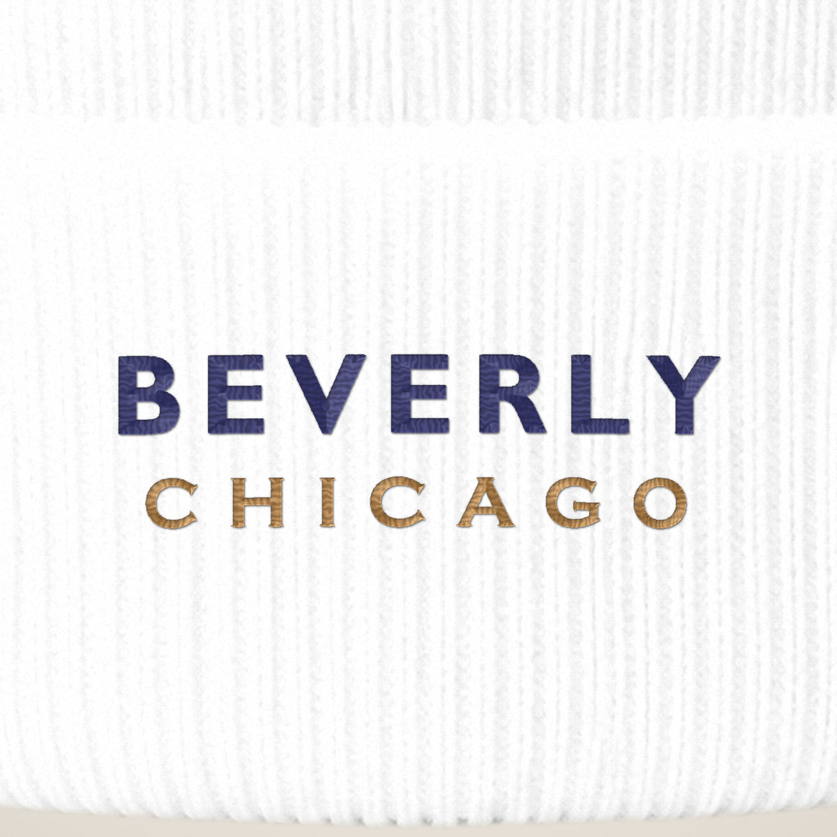Beverly Chicago embroidery close-up in navy and old gold thread