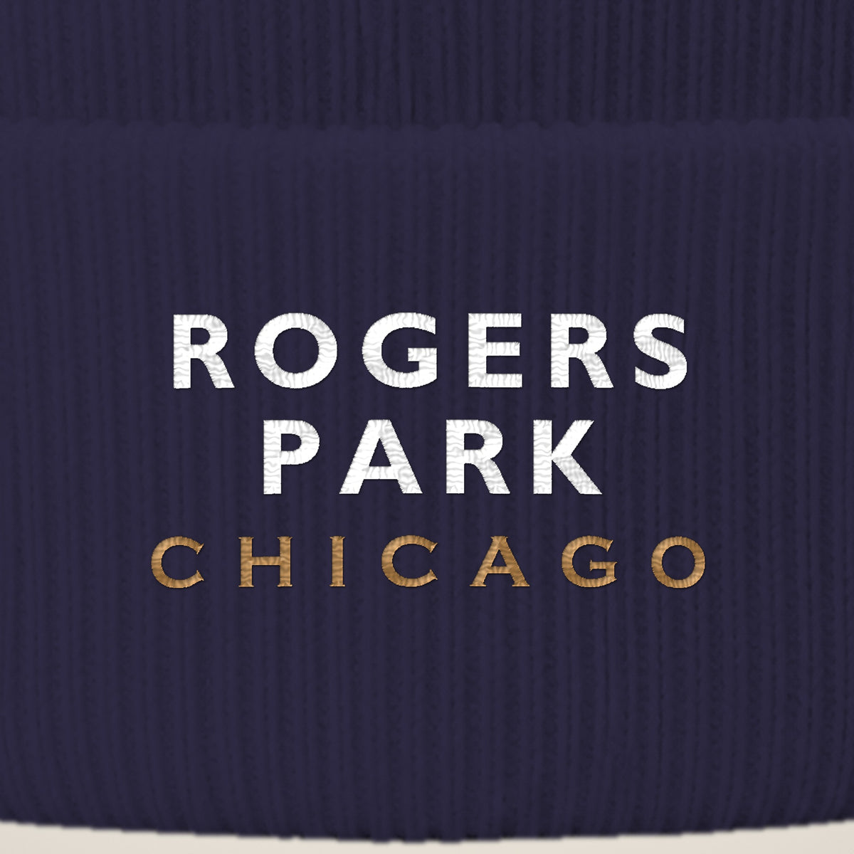 Rogers Park Chicago embroidery close-up in white and old gold thread