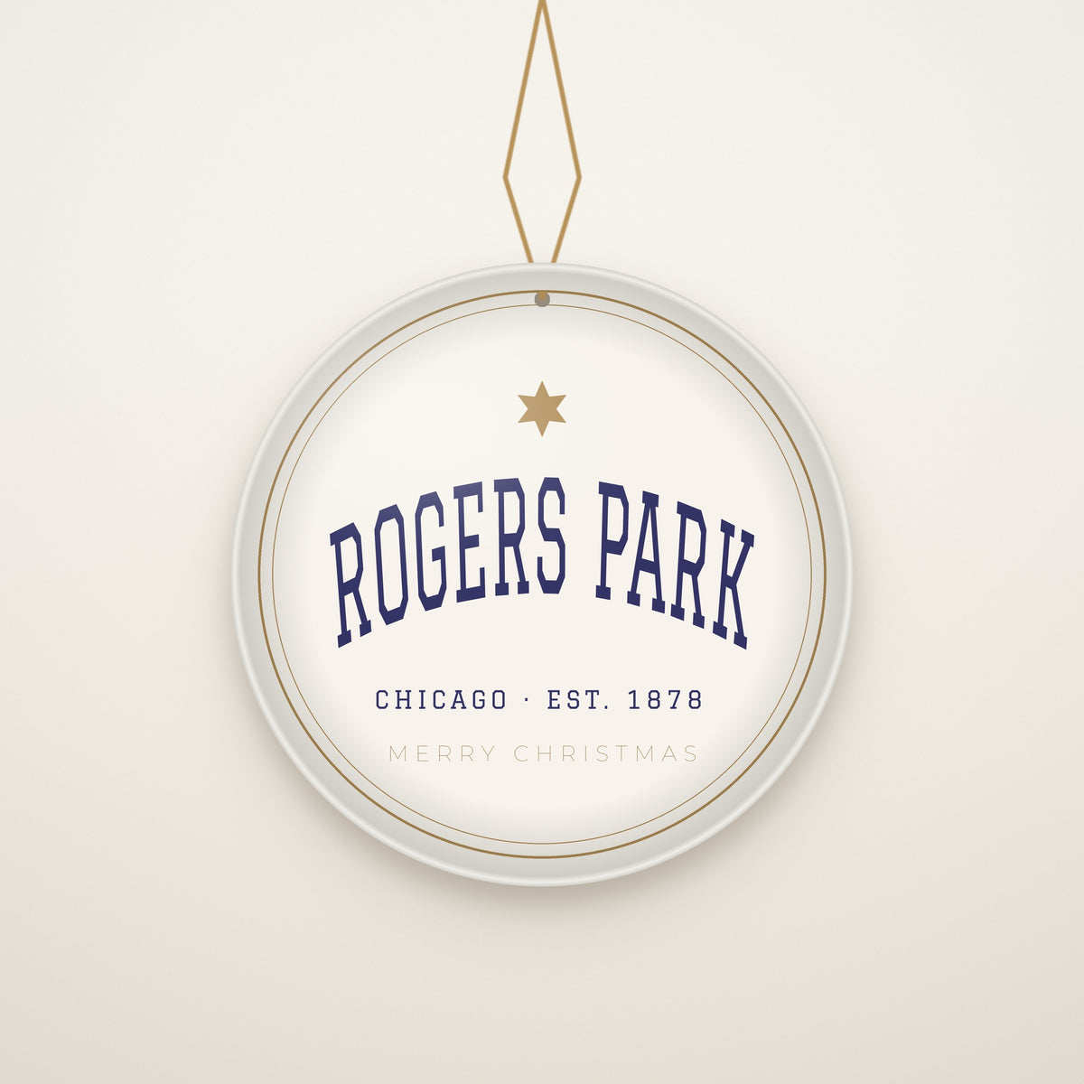 Rogers Park Chicago Christmas Ornament, Est. 1878 hanging on a gold cord, ivory backdrop