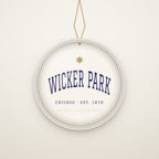 Wicker Park Chicago Christmas Ornament, Est. 1870 hanging on a gold cord, ivory backdrop