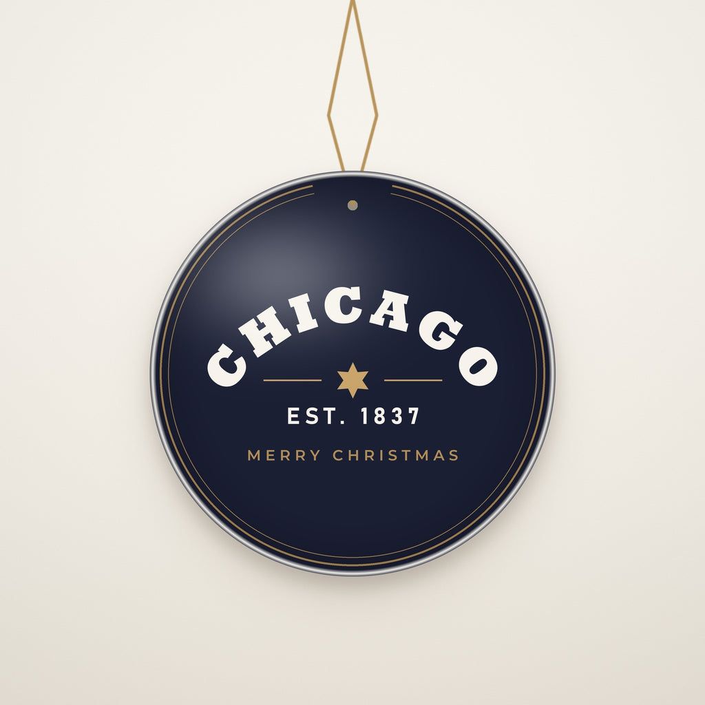 Chicago Est. 1837 Ceramic Christmas Ornament hanging on a gold cord, ivory backdrop