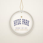 Hyde Park Chicago Christmas Ornament, Est. 1853 hanging on a gold cord, ivory backdrop