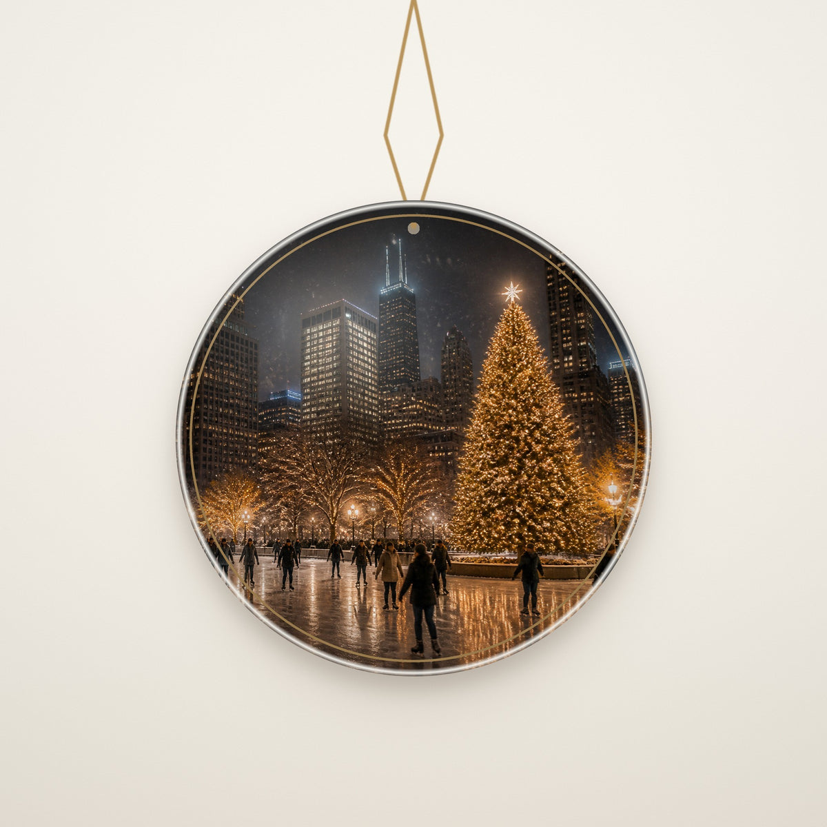 Skating Under the Skyline Chicago Christmas Ornament hanging on a gold cord, ivory backdrop