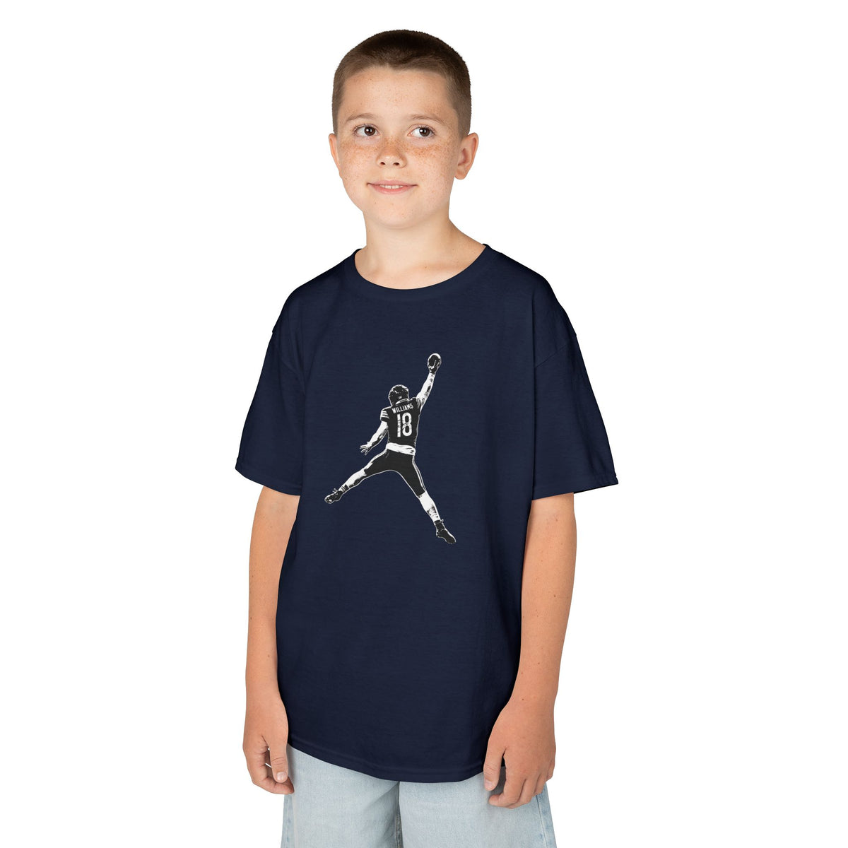 Boy wearing the Youth Caleb Williams Jump Man t-shirt in navy
