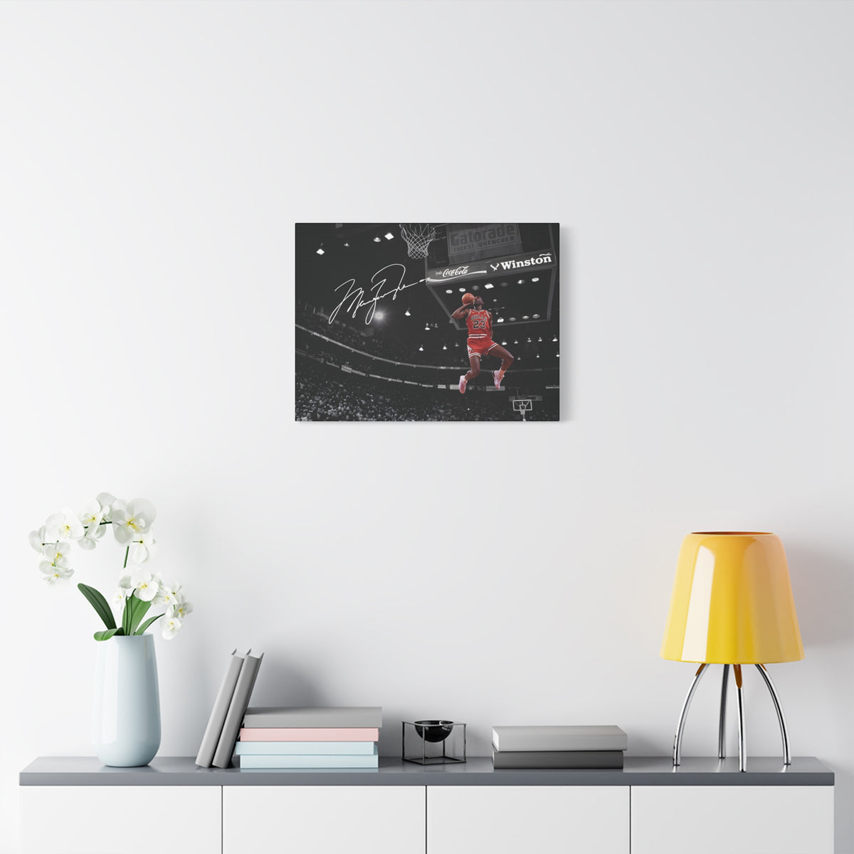Michael Jordan slam dunk canvas wall art, small size on a white wall above a sideboard