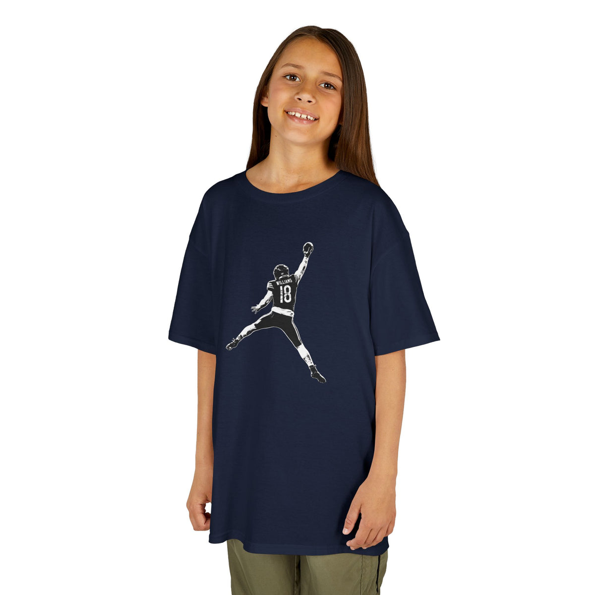 Girl wearing the Youth Caleb Williams Jump Man t-shirt in navy