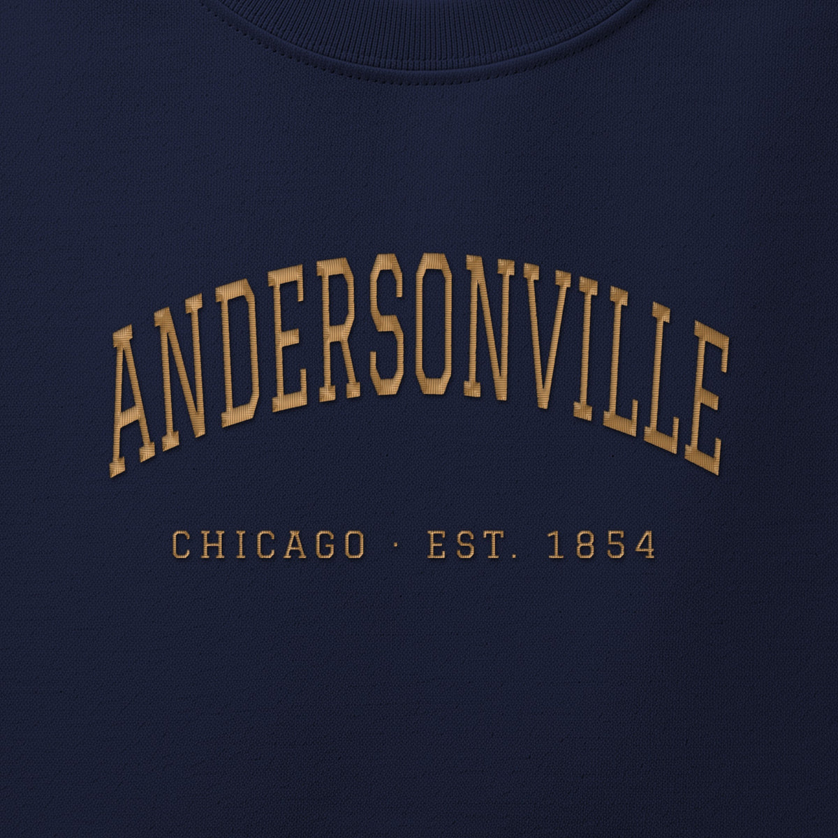 Close-up of gold satin-stitch Andersonville embroidery