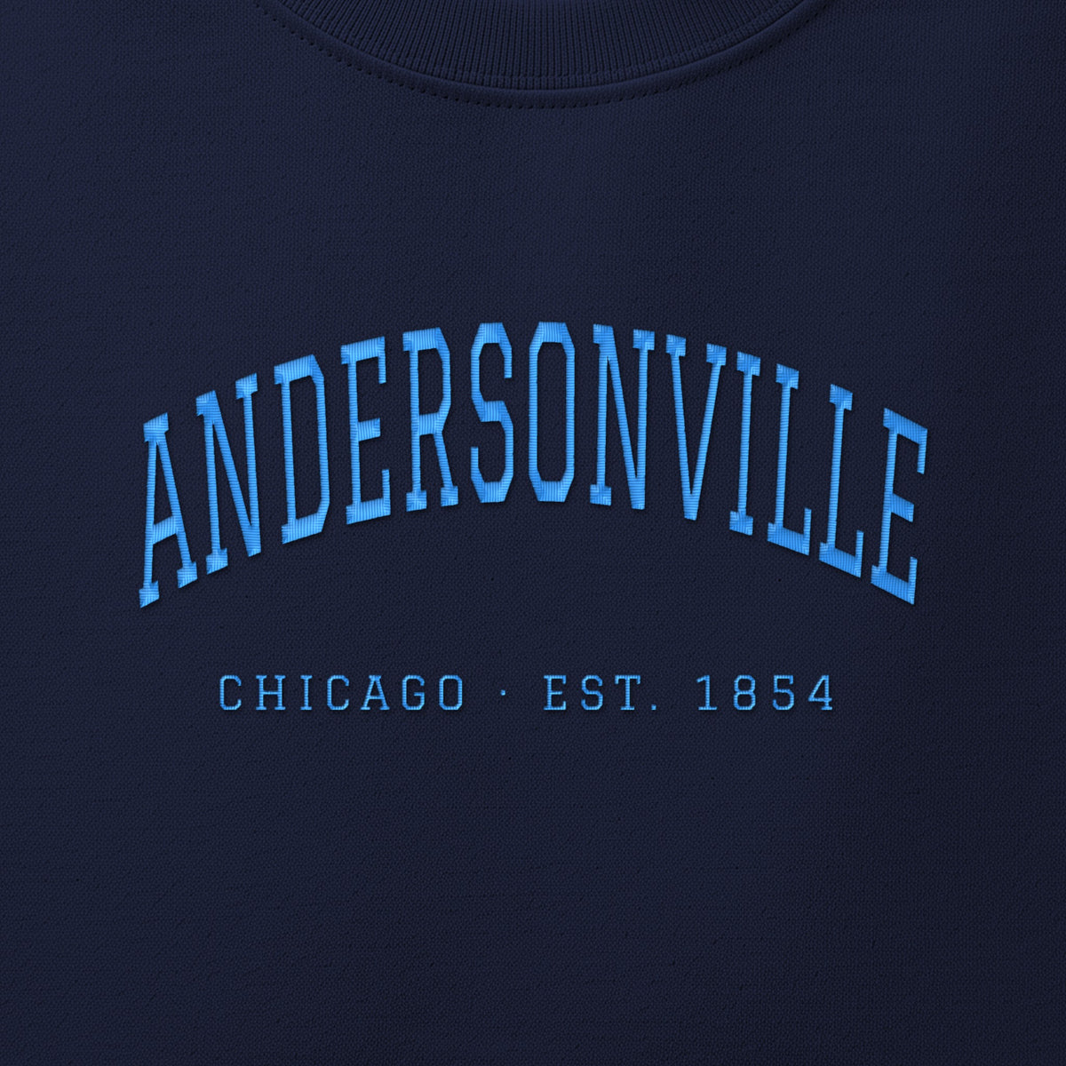 Close-up of sky blue satin-stitch Andersonville embroidery