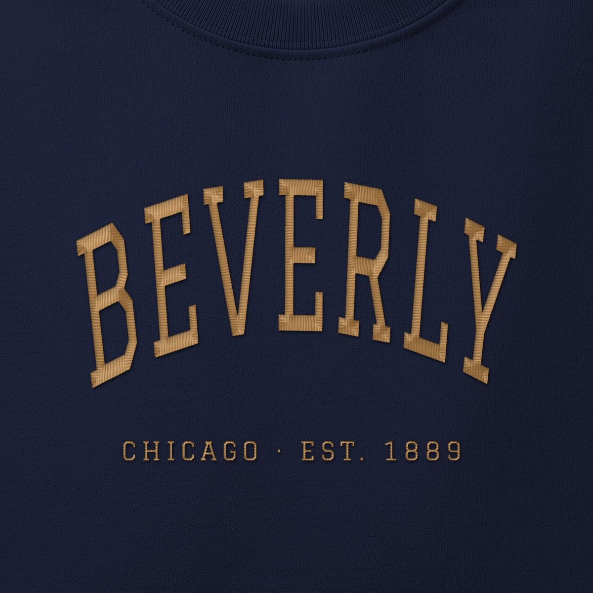 Close-up of gold satin-stitch Beverly embroidery