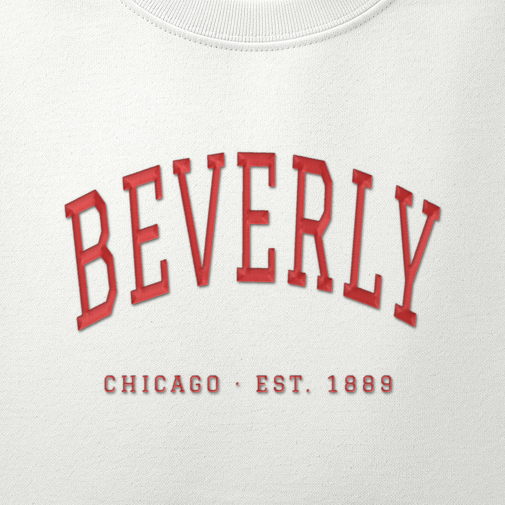 Close-up of red satin-stitch Beverly embroidery