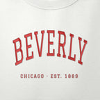 Close-up of red satin-stitch Beverly embroidery